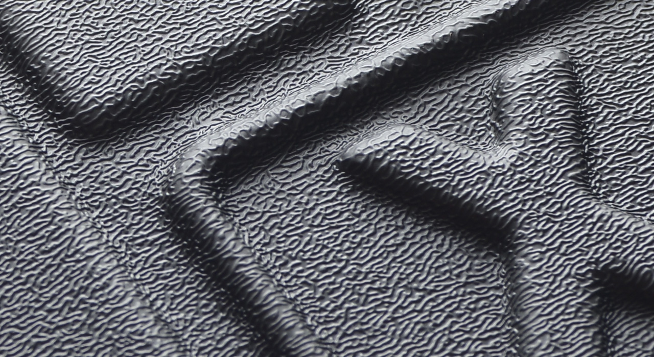 текстура килимка багажніка Havoc USA